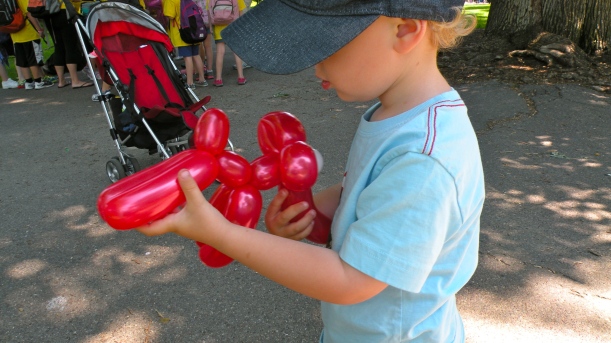 He didn't quite know what to do with his red elephant.